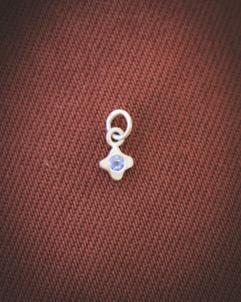 Tiny Bloom Charm - Sterling + Tanzanite
