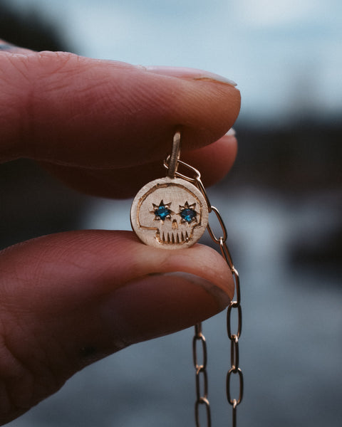 Skully Charm - Solid 14k Gold & Montana Sapphires
