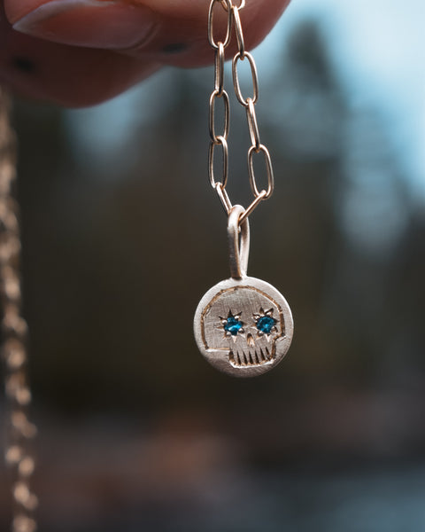 Skully Charm - Solid 14k Gold & Montana Sapphires