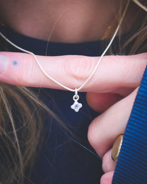 Tiny Bloom Charm - Sterling + Tanzanite